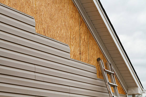 Professional Siding Contractor technician working in Great Falls, VA